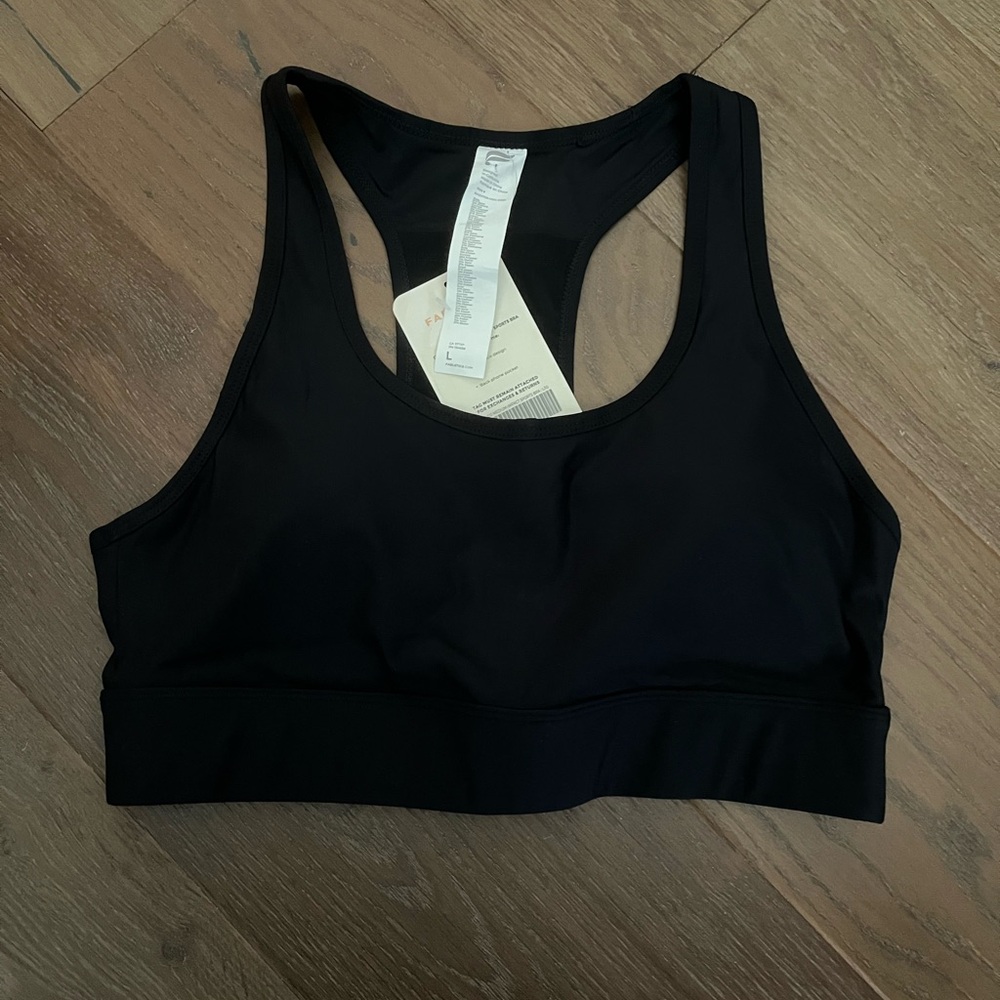 Fabletics on-the-go Medium impact racerback black sports bra. NWT. Size Large.